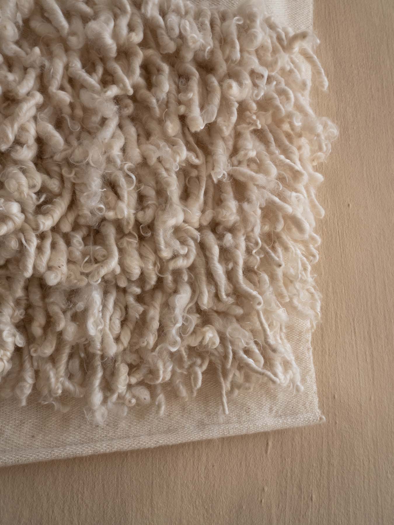 Handwoven Curly Mohair limited edition wall hanging artwork. Woven in our Cape Town studio using locally sourced natural fibres & sustainable craft techniques