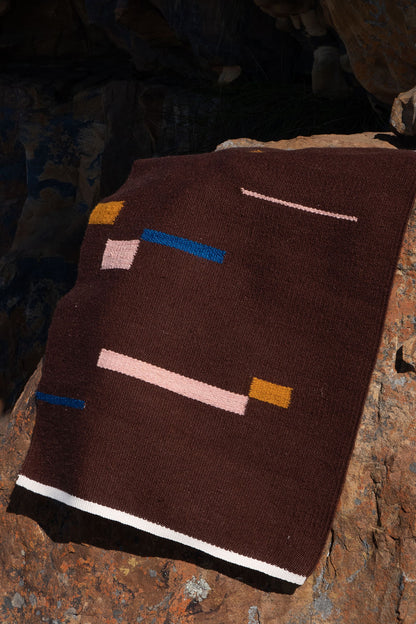 Handwoven mohair & wool rug from the Striation collection