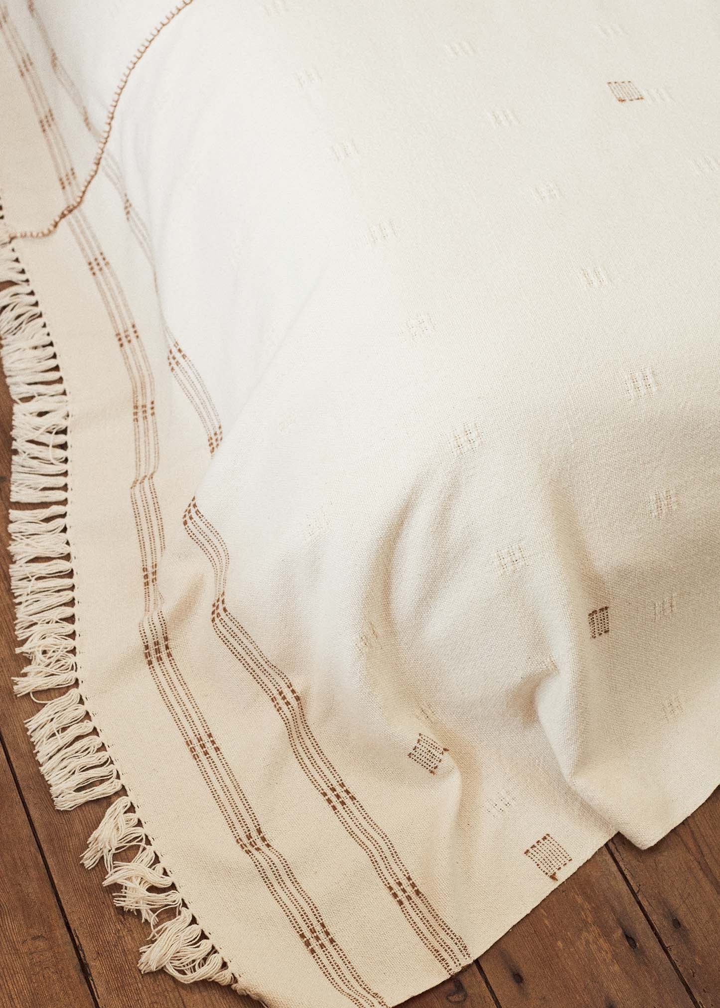 The Spine Blanket, our luxurious handwoven & hand stitched local, natural cotton blanket